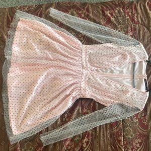 I’m selling my dress, it’s pink with black dots on the dress.